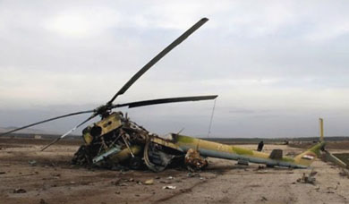 ISIL downs helicopters, softens Baghdad defenses with car bombs