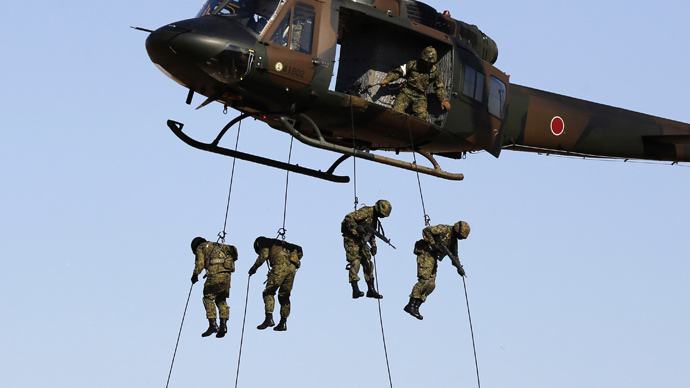 Japan poised to pass new defense act to lift post-WWII restrictions