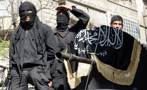 Syrian opposition leader urges Nusra Front to break from Al Qaida