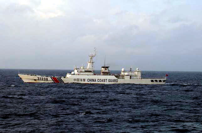 Japan threatens to repel armed Chinese vessels with naval force Japan threatens to repel armed Chinese vessels with naval force