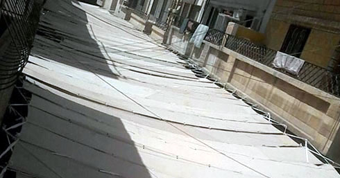 ISIL drapes Raqqa streets in bedsheets in bid to stop drone strikes