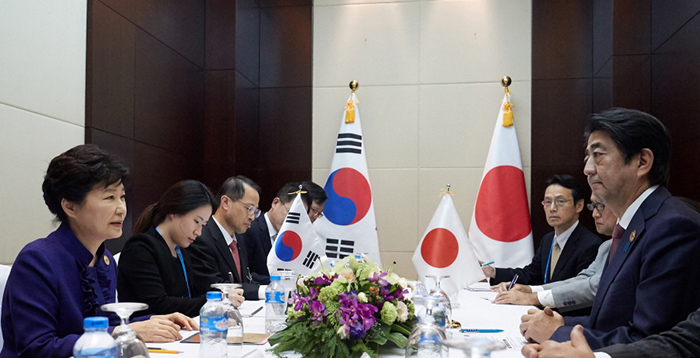 Japan, S. Korea end bilateral tension with joint response to N. Korean missile threat
