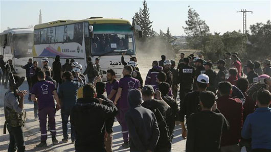 Assad regains control as militants, families exit Douma after suspected chemical attack