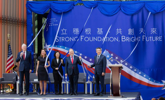 On same day as summit U.S. rattles China, dedicates massive new Taipei compound