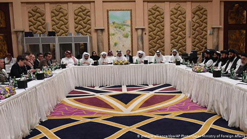 Iran, U.S. trade warnings as Taliban deal signed