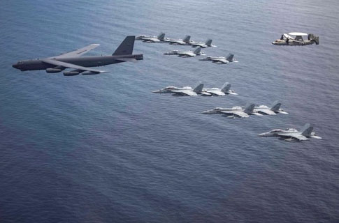 Clashing U.S. and Chinese military exercises signal increased risk of war
