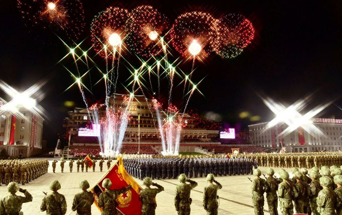An emotional Kim mobilizes maskless masses to showcase world’s largest ICBM