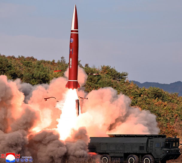 Kim Jong-Un showcases weapons buildup; North Korea claims missile test success